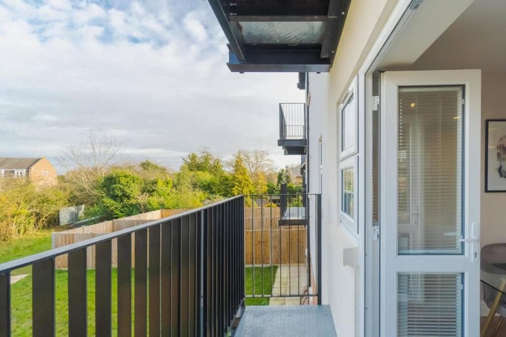 Stylish Windsor Getaway w Balcony - Free Parking - By Tempstay