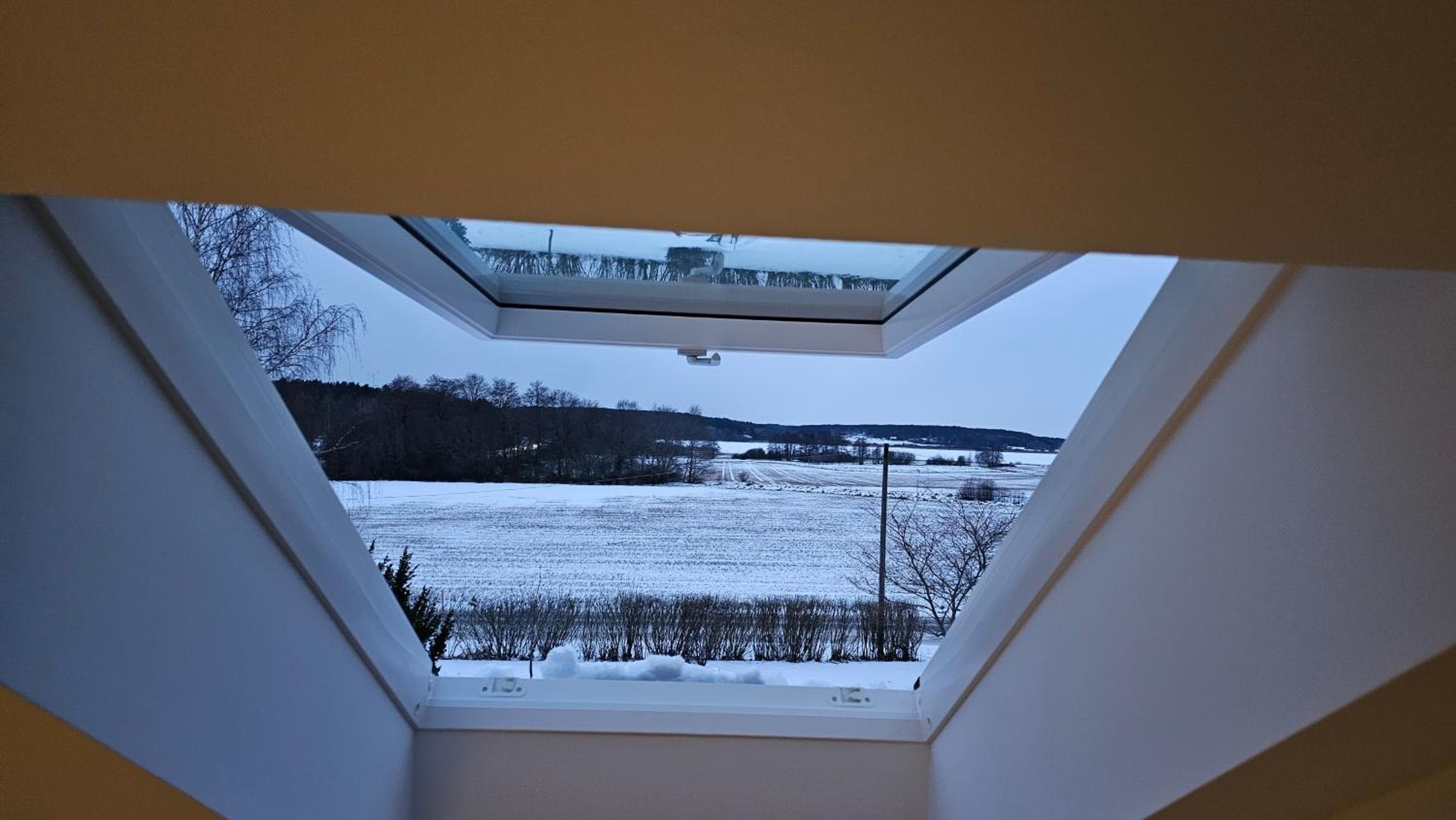 Attic floor with views over fields and sea