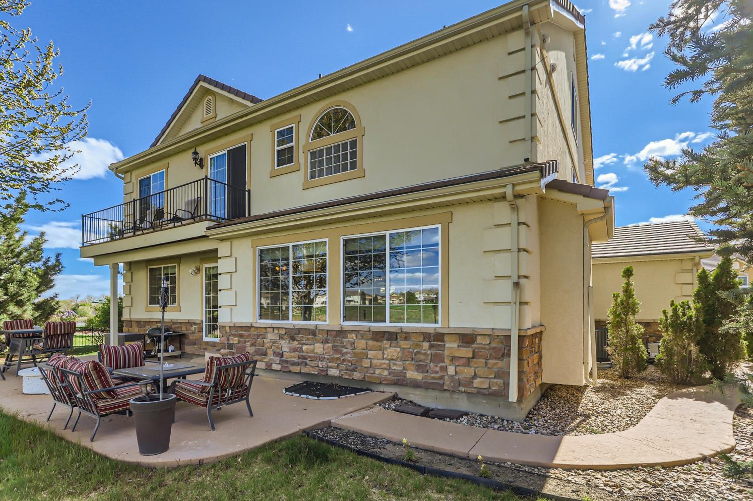 Denver Retreat Home with Stunning Lake, Mountain Views and Luxury Amenities