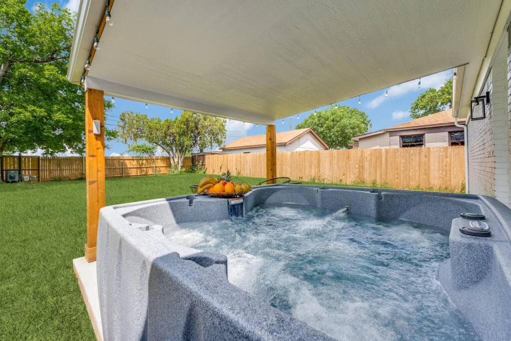 Spacious 4BR Home, Lux Hot Tub & Secure Gated Yard, Near Airport & Attractions